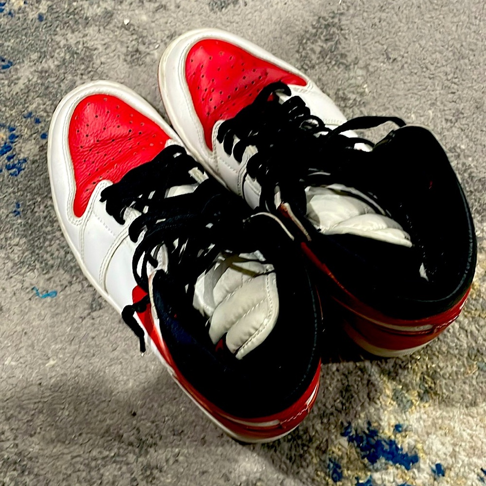 Red and white hip top Jordan’s